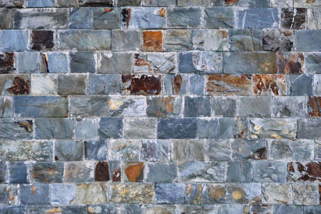 Rustic stone slate bricks wall facing ceramic porcelain tiles stonewearの写真素材