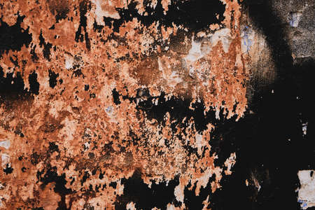 Old ruin wall with peeling paint, grunge background or textureの写真素材