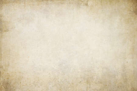 Old distressed parchment paper texture or backdropの写真素材