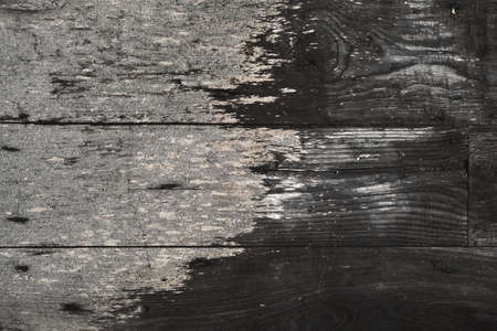 Old weathered wooden planks wall with damp, grunge rustic background or textureの写真素材