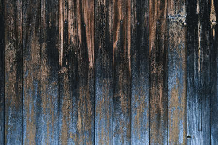 Old weathered wooden planks wall with damp, grunge rustic background or textureの写真素材