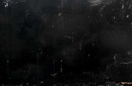 Black coloed plaster wall detail, grunge background or textureの写真素材