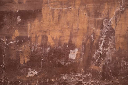 Old weathered brown painted wall grunge background or textureの写真素材