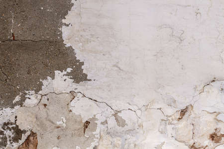 Old whitewashed lime wall, white grunge background or textureの写真素材