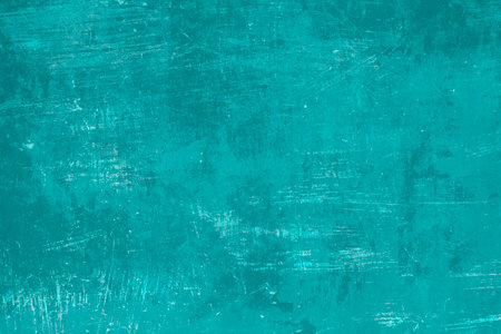Old worn out turquoise colored metal sheet background, grunge textureの写真素材