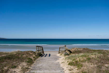 Walkway to the beach A Lanzada, in Galicia, Spainの写真素材