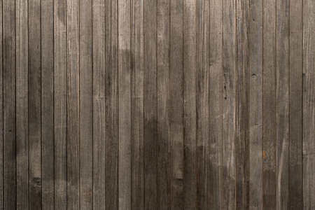 Wooden planks wall, dark wood rustic backgroundの写真素材