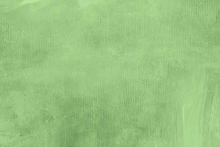 Pistachio green colored background canvas textureの写真素材