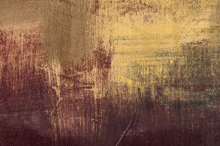 Brown and yellow stained canvas, abstract painting background, grunge textureの写真素材