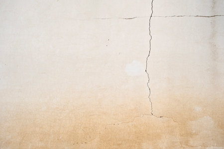 Crack on old lime washed wallの写真素材