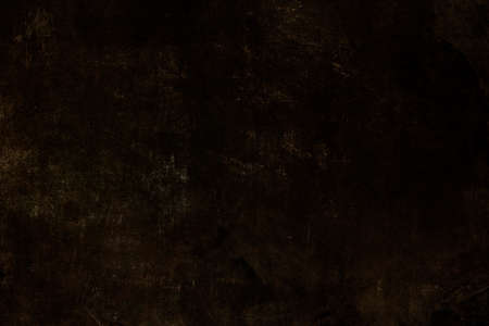 Worn out dark brown grunge backgroundの写真素材