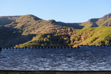 Traditional slate roof in a mountain cabinの写真素材