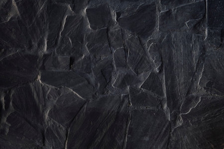 Black slate stone wall textureの写真素材