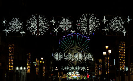 Christmas lights and giant wheel in the city of Vigo, Spainの写真素材