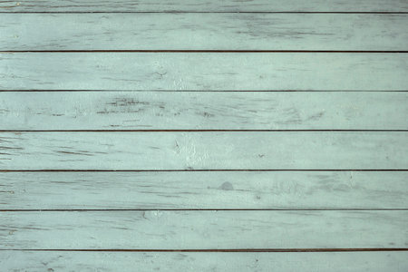 Light green painted wooden planks wall backgroundの写真素材