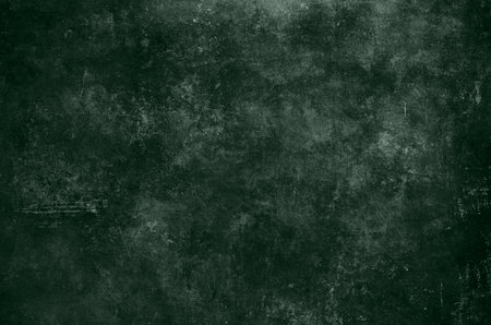 Worn out dark green grunge backgroundの写真素材