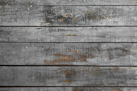 Old grey painted rustic wooden planks wall, distressed  background or textureの写真素材