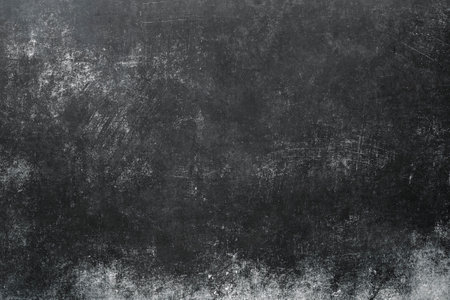 Worn out black scraped grunge backgroundの写真素材