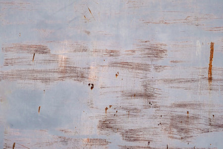 Old worn out blue painted corroded metal sheet grunge backgroundの写真素材