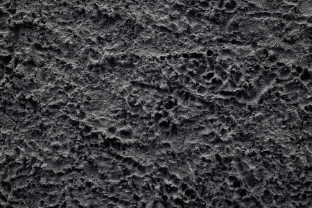 Detail of rough cast plaster finish wall textureの写真素材