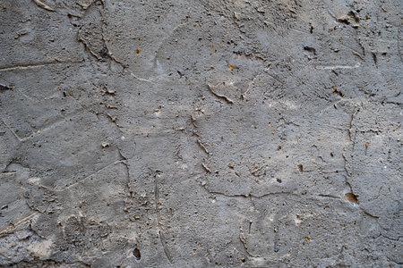 Detail of wall rough textured plaster finishの写真素材