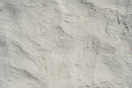 Old rustic limewashed wall plaster grunge backgroundの写真素材
