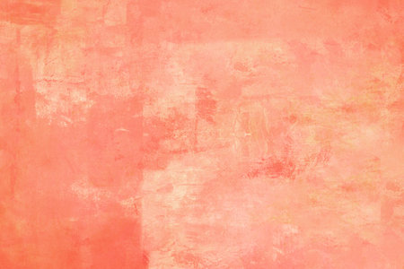 Coral pink painted grunge backgroundの写真素材