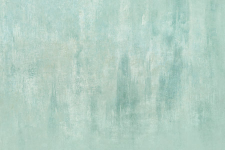 Aquamarine colored old wall detail, grunge worn out backgroundの写真素材