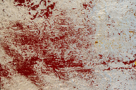 Detail of old wall texture with layers of scraped paintの写真素材