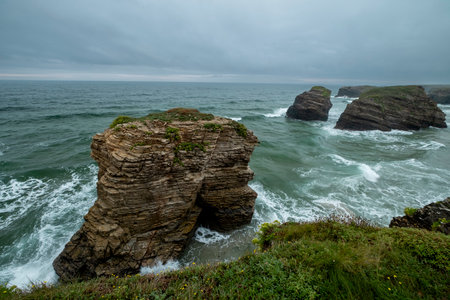 High tide in As Catedrais beach, Ribadeo, Marina Lucense, Galicia, Spainの写真素材