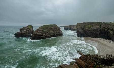 High tide in As Catedrais beach, Ribadeo, Marina Lucense, Galicia, Spainの写真素材