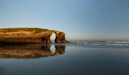 Sea arch in the Natural Monument of As Catedrais Beach, Ribadeo, Galicia, Spainの写真素材