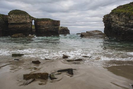 Salt weathering erosion on rock formations in the coastline of Ribadeo, Lugo, Spainの写真素材