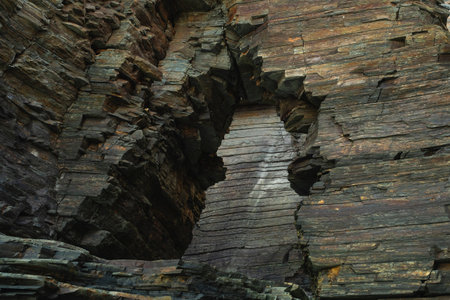 Sea arch eroded by sea action in As Catedrais Beach, Galicia, Spainの写真素材