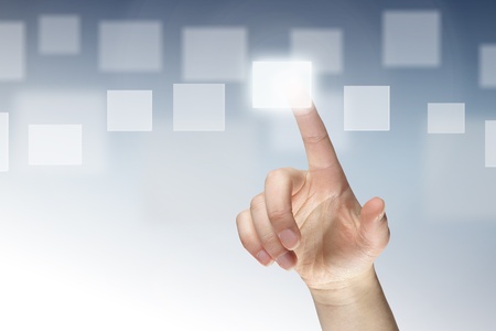 Female finger pressing virtual button の写真素材