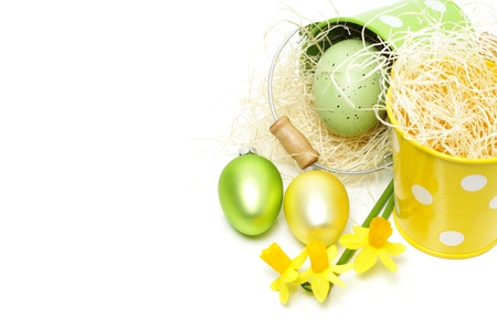 Easter eggs in little buckets on whiteの写真素材