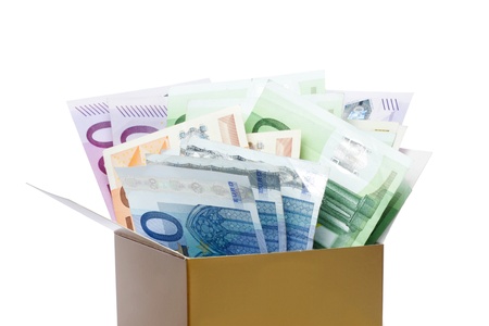 Euro banknotes in a box isolated on whiteの写真素材