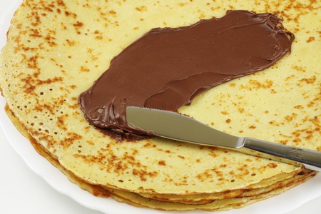 Home made pancake with chocolate spreadの写真素材