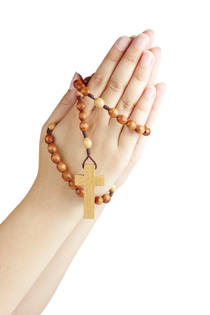 Hand with a rosary isolated on white backgroundの写真素材