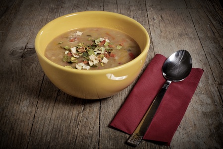 Vegetable soup on wooden tableの写真素材