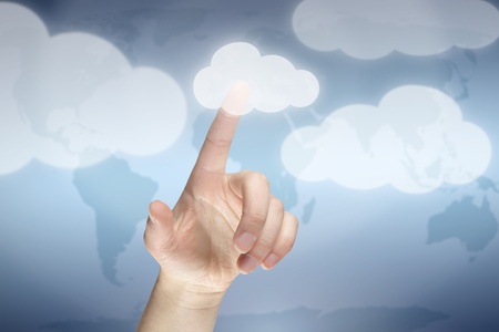 Cloud computing concept, finger touching the cloudの写真素材