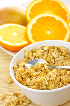 Cereals with fresh orange fruitの写真素材