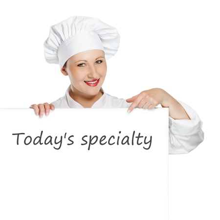 Young female chef showing today's menuの写真素材
