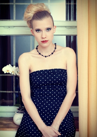 Attractive young woman  in retro styleの写真素材