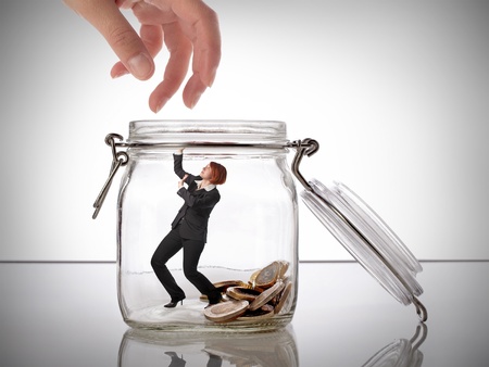 Woman protecting her savings, concept imageの写真素材