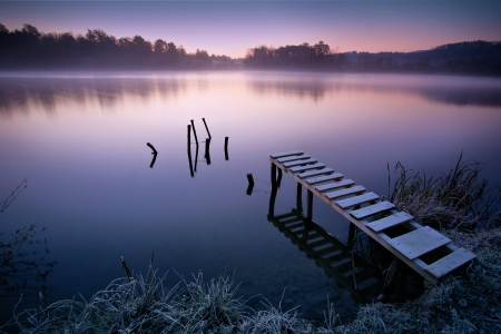 Misty lake in early morning Misty lake in early morning