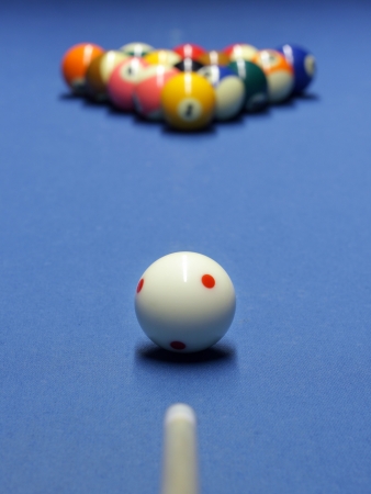 Blue billiard table with white and all the other  ballsの写真素材