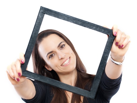 Woman with a frame around her face isolated on white の写真素材
