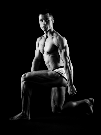 Muscular man posingの写真素材