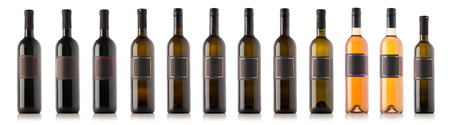 Wine bottle collection isolated on whiteの写真素材